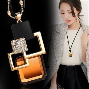 Elegant Gold and Black Geometric Pendant Necklace